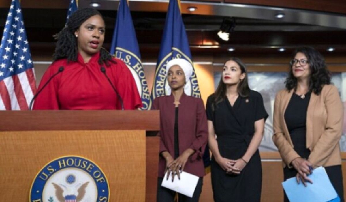 In this July 15, 2019 file photo, (from left) Rep. Ayanna Pressley, D-MA, Rep. Ilhan Omar, D-MN, Rep. Alexandria Ocasio-Cortez, D-NY, and Rep. Rashida Tlaib, D-MI, respond during a news conference at the Capitol in Washington, DC. (AP Photo/J. Scott Applewhite)